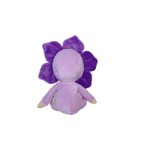 Purple plush toy with flower-like design on a white background