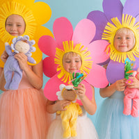 Adorable Dozy Dinkums plush flower doll in Pickle Lavender. Soft and cuddly, perfect for play and snuggling. Made from high-quality, safe materials.