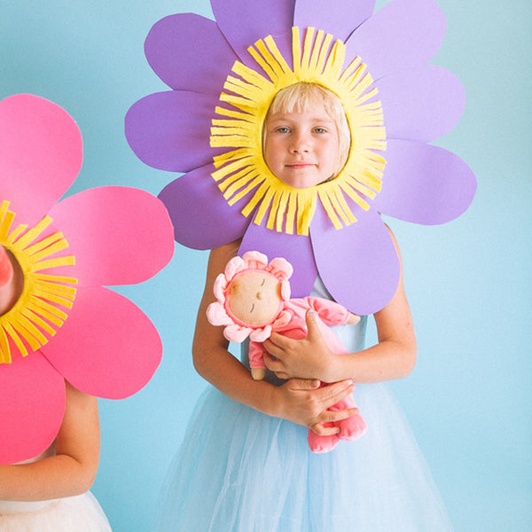 Charming Twinkle Fuchsia Dozy Dinkums plush flower doll by Olli Ella. Ideal for imaginative play and comfort, crafted from durable, child-friendly fabrics.