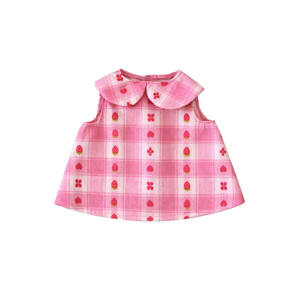 Pink checkered dress with a patterned collar on a white background