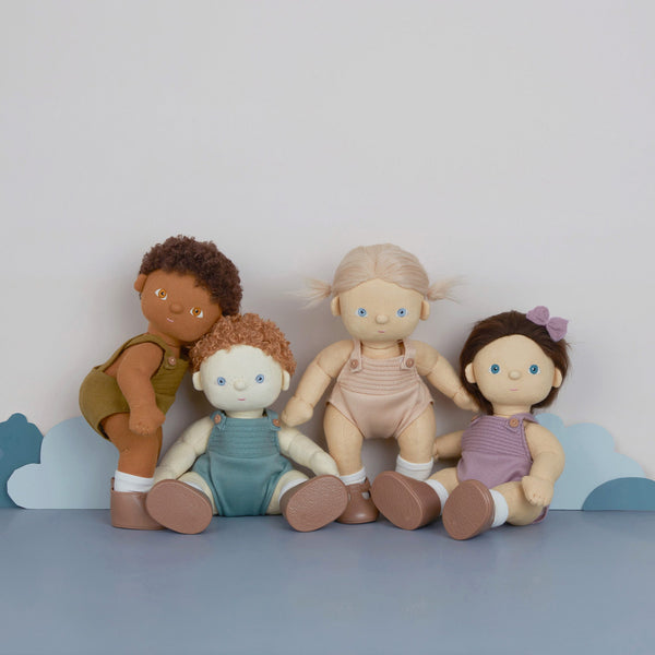 Strawberry blonde haired, posable doll for kids. Snuggle them, dress them up and style their hair. Each Doll comes with its own removable gender-neutral outfit, socks, nappy, and shoes, perfect for interative doll play.