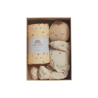 Keepsake gift set featuring a beautiful soft doll and matching swaddle cloth. The lullaby Lyra includes a pompom on their bonnet that plays a sleepy tune when pulled, perfect for soothing newborns, making it the perfect gift for newborns and expecting parents.