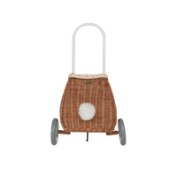 Rattan wheely basket with printed lining. Easter themed basket on wheels for kids to transport or store their favourite toys and treasures.