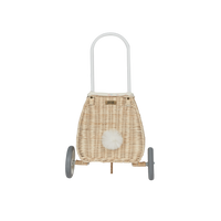 Woven rattan basket on wheels with printed flower lining. Perfectly sized for your kid to transport their favourite toys, dolls and treasures on their adventures. 