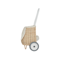 Rattan wheely basket with printed flower lining. Easter themed basket on wheels for kids to transport or store their favourite toys and treasures.