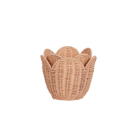 Scalloped edge handwoven rattan basket set. Pink nesting baskets perfect for storing dolls, toys, baby essentials and everything in between in your nursery or kids bedroom.