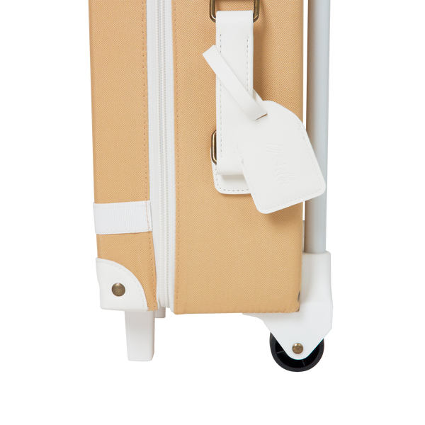 The ultimate kids travel suitcase. Yellow suitcase for kids holidays, with straps to carry their favourite doll / toy.