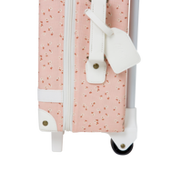 The ultimate kids travel suitcase. Pink daisies print suitcase for kids holidays, with straps to carry their favourite doll / toy.