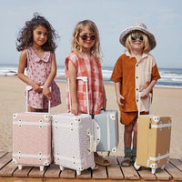 Kids travel suitcase in pink daisy print. The perfect kids suitcase for holidays with compartments for dolls and trinkets.