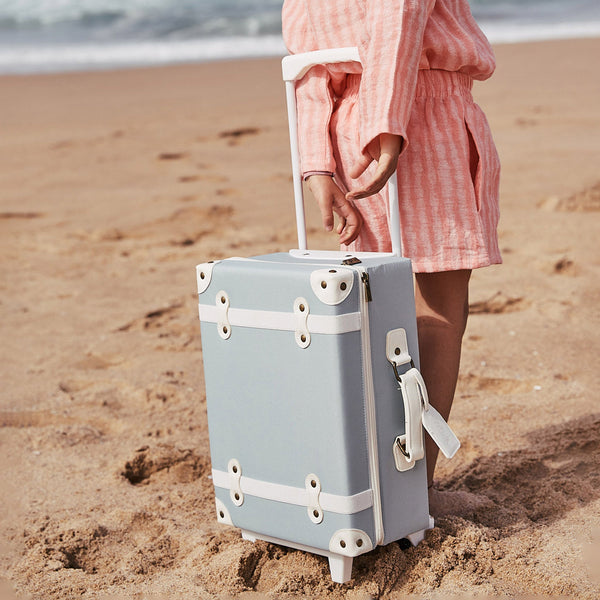 Kids travel suitcase in baby blue colour. The perfect kids suitcase for holidays with compartments for dolls and trinkets.