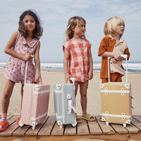 The ultimate kids travel suitcase. Blue suitcase for kids holidays, with straps to carry their favourite doll / toy.