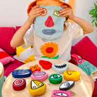 Tubbles Funspressions - Silly Sam by Olli Ella Kids colorful sensory stones with interchangeable silly facial expressions displayed during imaginative play